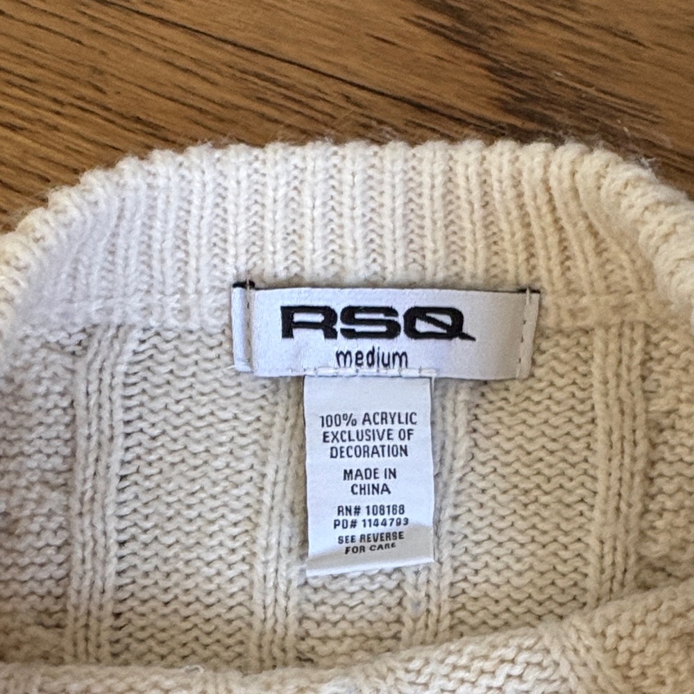 RSQ Cream Cable Knit Sweater with Black Bows - Picture 2 of 3